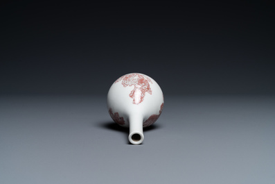 A small Chinese copper-red bottle vase with Buddhist lions, Kangxi