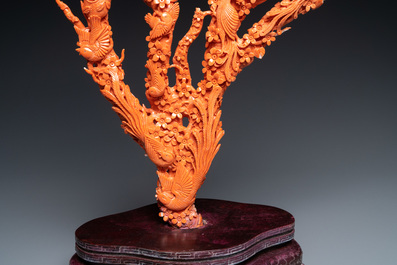 A large Chinese carved red coral group with birds on floral branches, 19/20th C.