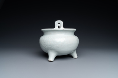 A large Chinese blanc de Chine censer with jade-topped wooden lid and stand, 18/19th C.