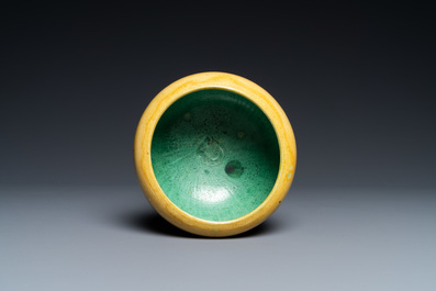 A Chinese monochrome yellow alms bowl with green interior, Kangxi