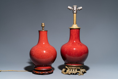 Two Chinese monochrome sang de boeuf-glazed bottle vases transformed into lamps, 19th C.
