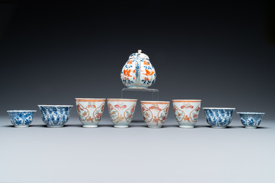 Eight Chinese blue and white and famille rose cups and saucers and an Imari-style teapot, Kangxi/Qianlong