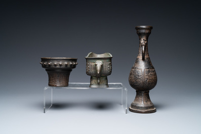 A Chinese bronze vase, a ewer and a censer, Ming/Qing