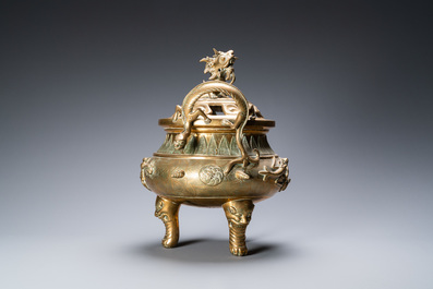 A large Chinese bronze censer and cover on stand with sea animals and shells, Qing