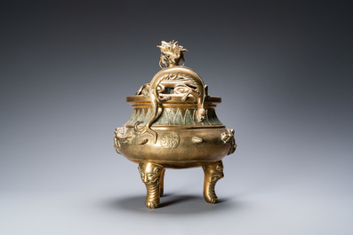 A large Chinese bronze censer and cover on stand with sea animals and shells, Qing