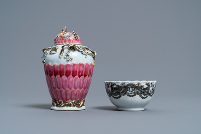 A Chinese famille rose tea caddy and a grisaille cup and saucer, Yongzheng/Qianlong