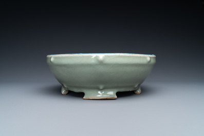 A Chinese enamelled celadon-glazed censer with a dragon on a lotus-shaped wooden stand, Qing