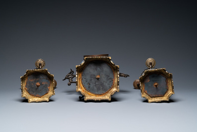A Chinese bronze-mounted three-piece blue and white clock garniture, 19th C.