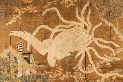 A large Japanese silk embroidery with a phoenix, Meiji, 19th C.
