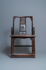 A pair of Chinese carved wooden chairs with wicker seats, 19th C.