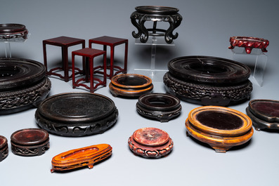 A varied collection of Chinese wooden stands, 19/20th C.