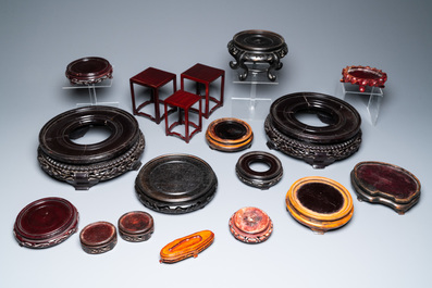A varied collection of Chinese wooden stands, 19/20th C.