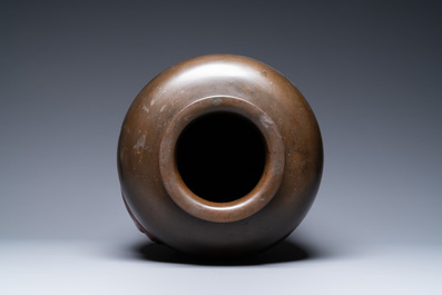 A large Japanese bronze 'koi' vase, Meiji, 19th C.