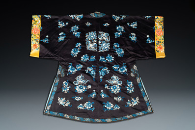 A Chinese 'forbidden stitch' embroidered silk ladies robe with flowers and butterflies, 19th C.