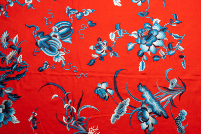 An exceptional large Chinese red-ground felt cloth with silk embroidery of blue and white flowers and peaches, 18/19th C.