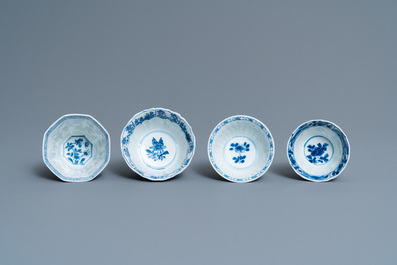 Twenty-one Chinese blue and white saucers and eighteen cups, Kangxi