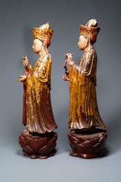 A pair of large Chinese or Vietnamese gilded, lacquered and painted wooden figures, 18/19th C.