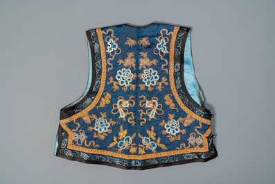 A Chinese embroidered silk jacket, a skirt and a sleeve fragment, Qing