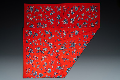 An exceptional large Chinese red-ground felt cloth with silk embroidery of blue and white flowers and peaches, 18/19th C.