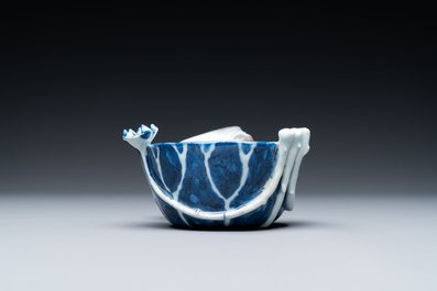 A Chinese blue, white and copper-red 'crab in lotus' water dropper, Kangxi