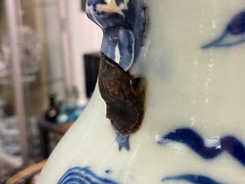 Three Chinese blue and white and celadon-ground 'Buddhist lion' vases, 19th C.