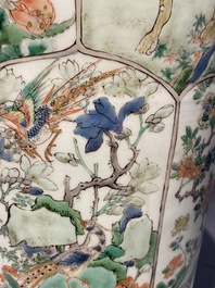 Une paire de vases en porcelaine de Chine famille verte &agrave; d&eacute;cor d'animaux mythiques, Kangxi