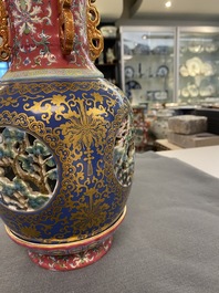 A four-piece Chinese famille rose revolving and reticulated vase, Qianlong mark, Republic