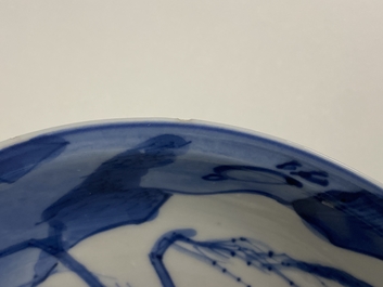 A Chinese blue and white 'Xi Xiang Ji' shallow bowl depicting Cui Yingying and her mother, Kangxi