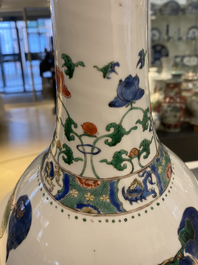 A large Chinese famille verte bottle vase with mythical beasts, Kangxi