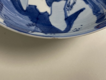 A Chinese blue and white 'Xi Xiang Ji' shallow bowl depicting Cui Yingying and her mother, Kangxi