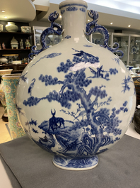 A large Chinese blue and white moonflask 'deer' vase, Qianlong mark and of the period