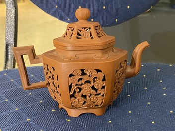 A Chinese reticulated double-walled Yixing stoneware teapot and cover, Kangxi