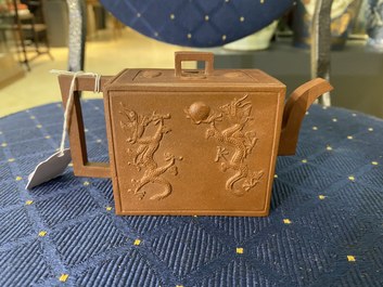 A Chinese rectangular Yixing stoneware 'dragon' teapot, seal mark, Kangxi