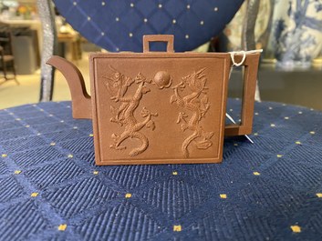 A Chinese rectangular Yixing stoneware 'dragon' teapot, seal mark, Kangxi