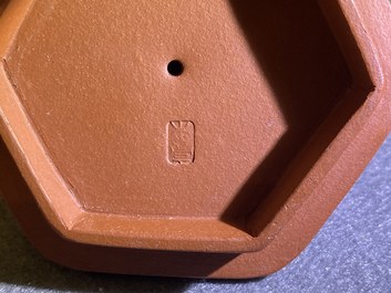 A Chinese reticulated double-walled Yixing stoneware teapot and cover, Kangxi