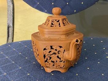 A Chinese reticulated double-walled Yixing stoneware teapot and cover, Kangxi