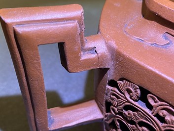 A Chinese reticulated double-walled Yixing stoneware teapot and cover, Kangxi