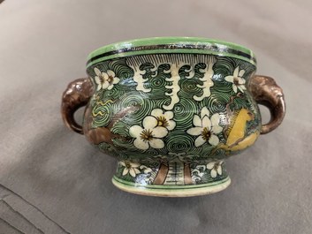 A Chinese verte biscuit 'flaming horses' censer, Jiajing mark, 18/19th C.