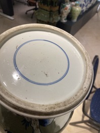 Un vase en porcelaine de Chine en bleu, blanc et rouge de cuivre &agrave; fond c&eacute;ladon, Kangxi