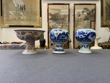 A pair of Chinese blue and white 'dragon' stem cups and one in copper-red, 19/20th C.
