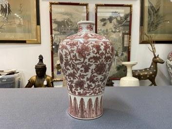 A Chinese copper-red 'meiping' vase with peony scrolls, Qianlong mark, 19/20th C.