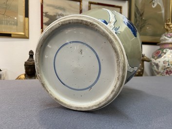 Un vase en porcelaine de Chine en bleu, blanc et rouge de cuivre &agrave; fond c&eacute;ladon, Kangxi