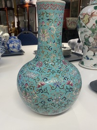 A Chinese famille rose turquoise-ground bottle vase, Qianlong mark, 19th C.