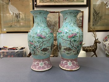 A pair of Chinese famille rose turquoise-ground vases with butterfly handles, 19th C.