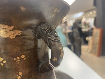 A Chinese gilt-splashed bronze vase, Qianlong mark, Qing