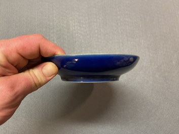 A Chinese monochrome blue dish, Qianlong mark and of the period