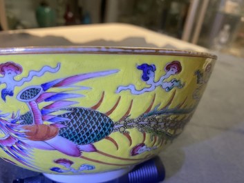 A Chinese yellow-ground famille rose 'dragon and phoenix' bowl, Xuantong mark and of the period