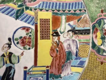 A large Chinese famille rose dish with figures in front of a temple, Yongzheng