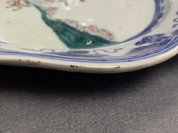 A pair of Chinese oval famille rose dishes with a lady in a garden, Qianlong