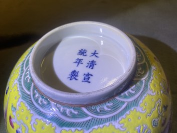 A Chinese yellow-ground famille rose 'dragon and phoenix' bowl, Xuantong mark and of the period